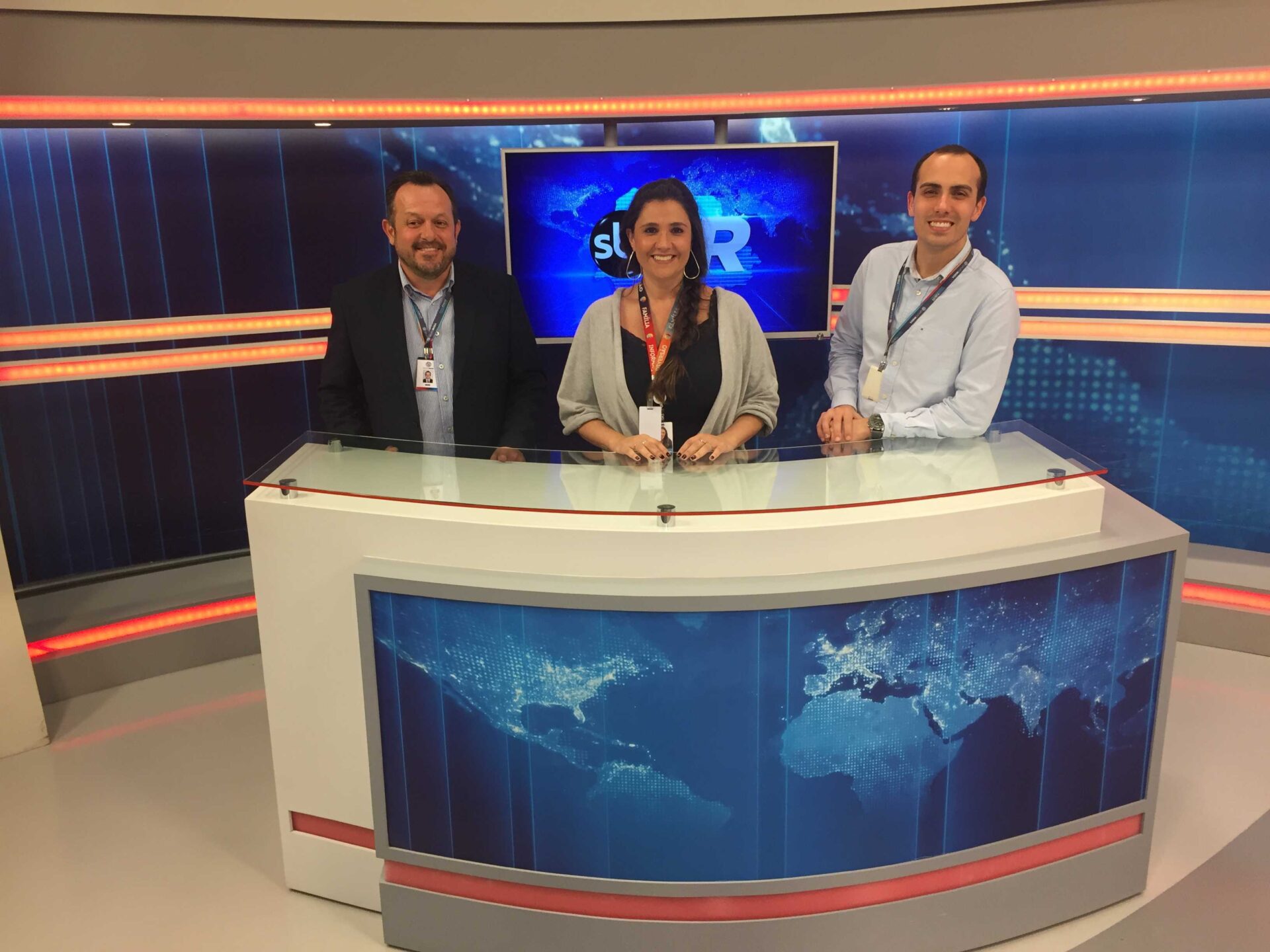 Joe and his colleagues sit on a set he helped create.